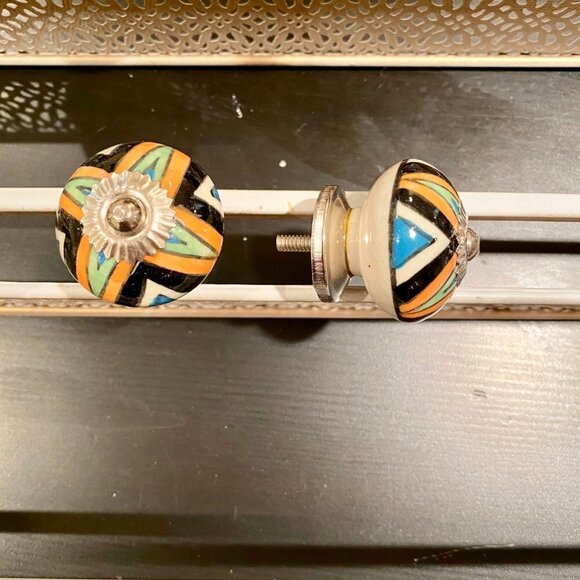 Many new sets of 6 black/orange ceramic pull/knobs - Picture 3 of 6